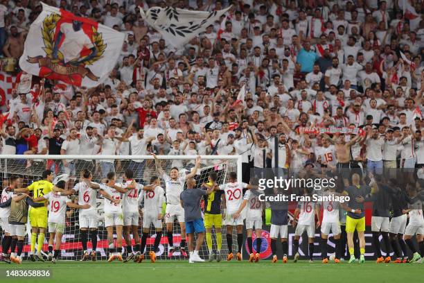 Players of Sevilla FC celebrate victory in front of their fans after defeating Manchester United during the UEFA Europa League Quarterfinal Second...