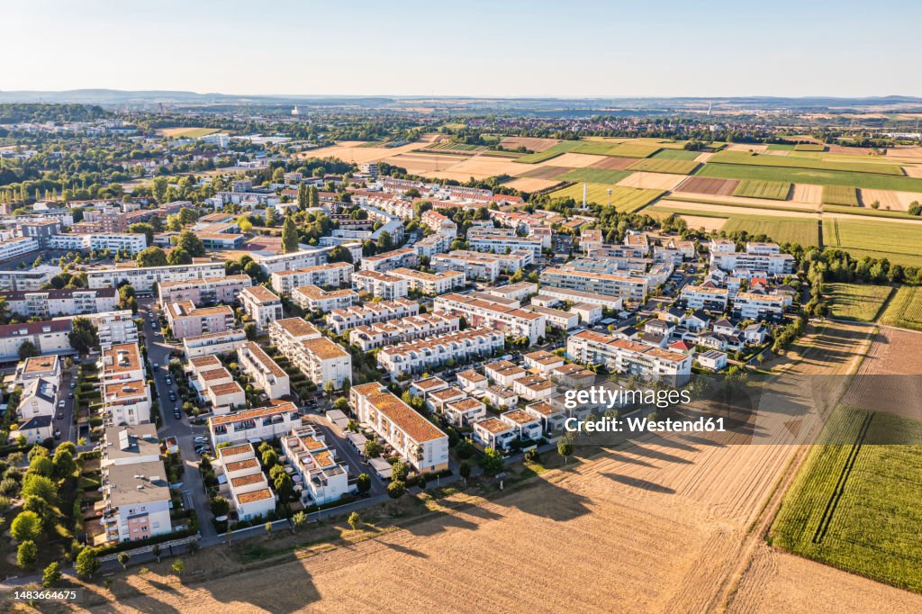 Germany, Baden-Wurttemberg, Ludwigsburg, Aerial view of modern residential area and surrounding fields