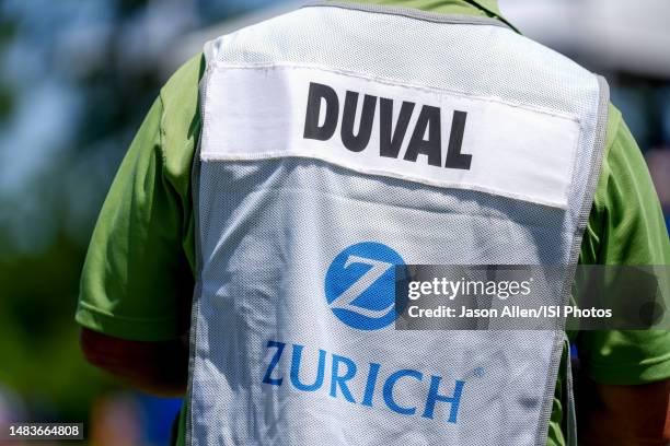 The vest of caddy to David Duval of the United States on the 13th hole during Round One of the Zurich Classic of New Orleans at TPC Louisiana at TPC...