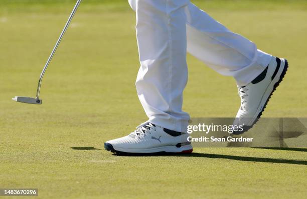 The shoes of Kyle Westmoreland of the United States on the first green during the first round of the Zurich Classic of New Orleans at TPC Louisiana...