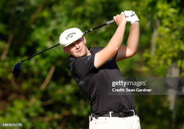 Harry Hall of England plays his shot from the second tee during the first round of the Zurich Classic of New Orleans at TPC Louisiana on April 20,...