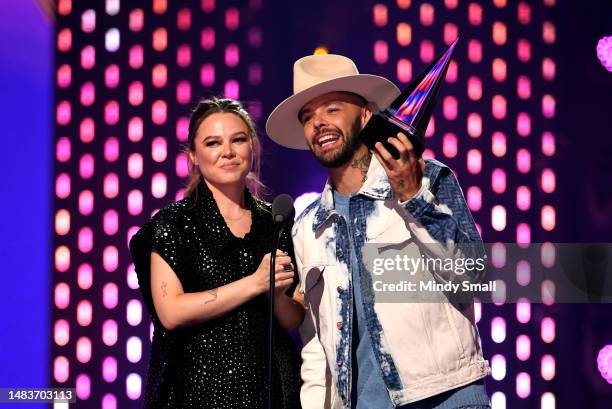 Joy Huerta and Jesse Huerta of Jesse y Joy accepts the Favorite Duo or Group award onstage during the 2023 Latin American Music Awards at MGM Grand...