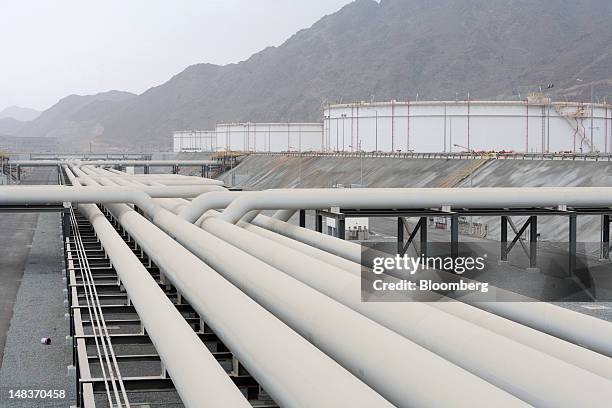 Oil transfer pipes and storage silos which form part of the Abu Dhabi Crude Oil Pipeline, known as Adcop, are seen on the day of pipeline's...
