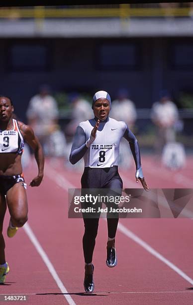 Marion Jones of the US, wearing the Nike bodysuit, runs to a victory in the Women's 100 meter Finals during the Prefontaine Classic at the Hayward...