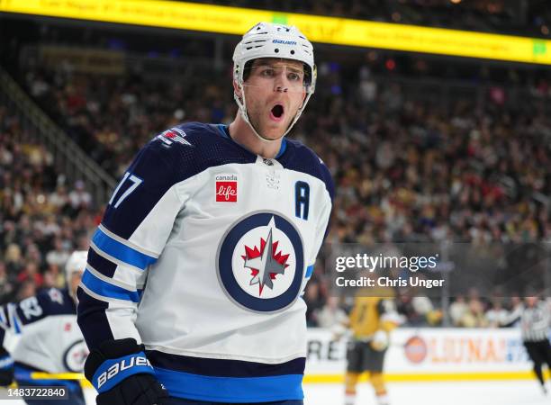 Adam Lowry of the Winnipeg Jets celebrates after scoring a goal during the first period against the Vegas Golden Knights in Game Two of the First...