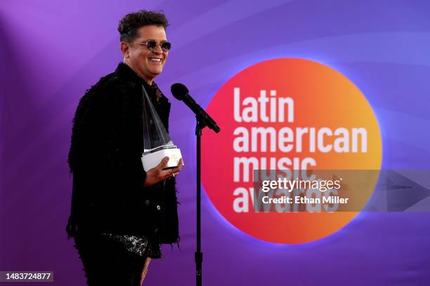 Carlos Vives, winner of the Legacy Award, poses in the press room during the 2023 Latin American Music Awards at MGM Grand Garden Arena on April 20,...