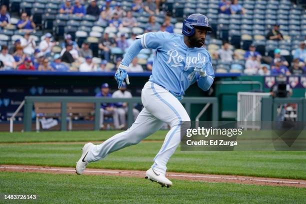 Jackie Bradley Jr. #41 of the Kansas City Royals runs to first after hitting against the Texas Rangers in the fifth inning at Kauffman Stadium on...
