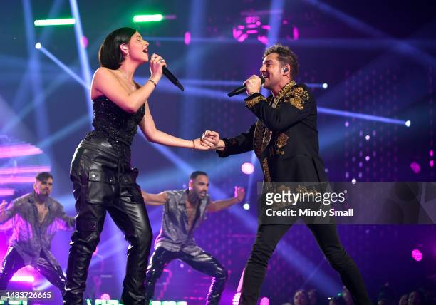 Ángela Aguilar and David Bisbal perform onstage during the 2023 Latin American Music Awards at MGM Grand Garden Arena on April 20, 2023 in Las Vegas,...