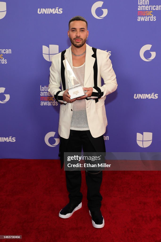 prince-royce-winner-of-the-pioneer-award-poses-in-the-press-room-during-the-2023-latin.jpg