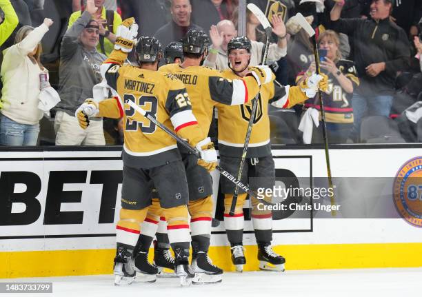 Jack Eichel of the Vegas Golden Knights celebrates with teammates after a goal during the second period against the Winnipeg Jets in Game Two of the...