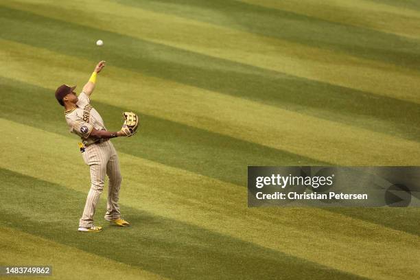 Outfielder Juan Soto of the San Diego Padres throws in a catch during the ninth inning of the MLB game against the Arizona Diamondbacks at Chase...