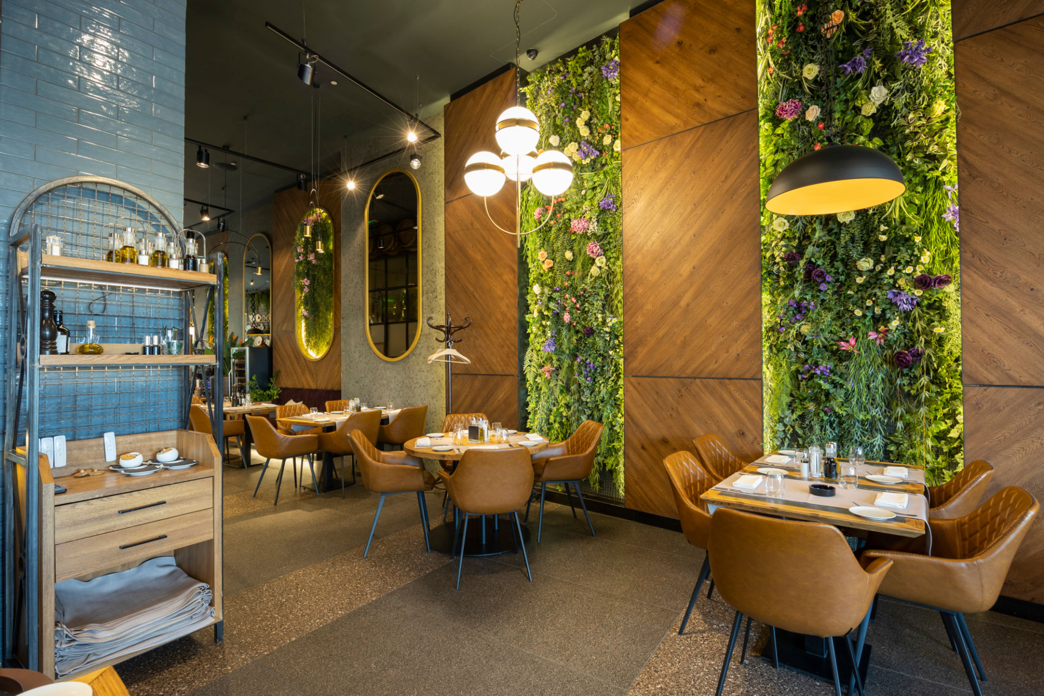 Interior of a luxury restaurant with flower decorated walls Interior of a luxury restaurant with flower decorated walls