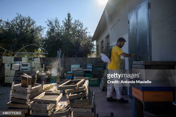 Lorenzo Buratti, beekeeper - breeder, enters the laboratory, on April 20, 2023 in Terracina, Italy. The effects of climate change demand urgent...
