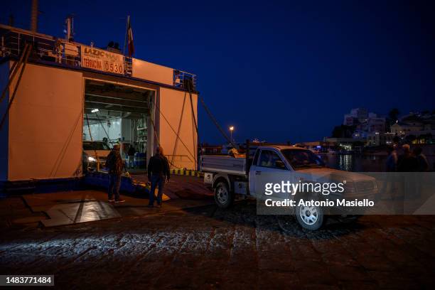 Two beekeepers, Marco and Wiliam on the pick-up disembark from the ferry with the fertilization nuclei at the port of Ponza, on April 19, 2023 in...