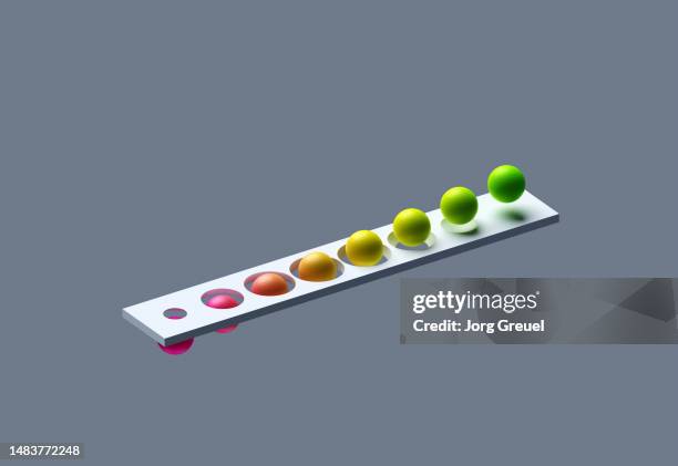 spheres penetrating a bar - penetrating stock pictures, royalty-free photos & images