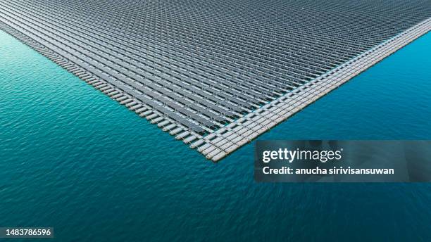 aerial view of solar on the water energy-saving alternatives. - sustainable resources stock pictures, royalty-free photos & images