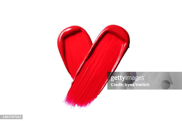 red lipstick smears in heart shape on white color background. viva magenta color of the 2023 year. - red lipstick swatch stock pictures, royalty-free photos & images