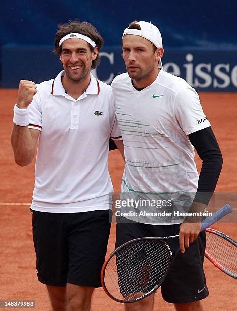 Jeremy Chardy of France celebrates winning with Lukasz Kubot of Poland after their doubles finale match against Michal Mertinak of Slovakia and Andre...