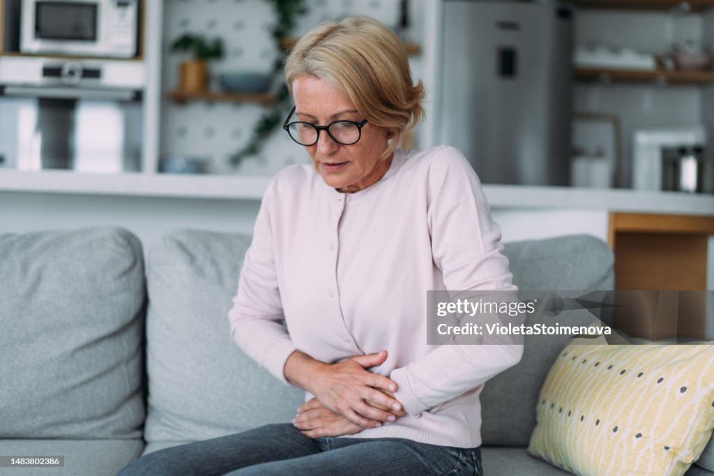 Woman suffering from period pains.
