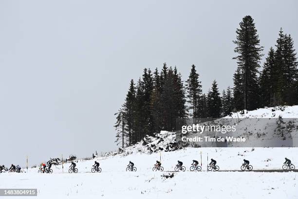 General view of the peloton climbing to the snowy and mountainous pass of the Passo Lavazè during the 46th Tour of the Alps 2023, Stage 5 a 144.5km...