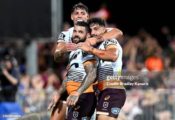 Adam Reynolds of the Broncos is congratulated by team mates after scoring a try during the round eight NRL match between Parramatta Eels and Brisbane...