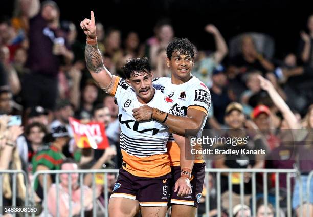 Kotoni Staggs of the Broncos is congratulated by team mate Selwyn Cobbo after scoring a try during the round eight NRL match between Parramatta Eels...