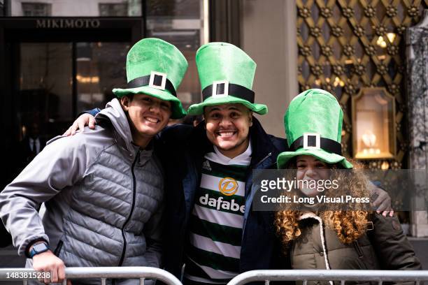 People wearing green clothes during the Saint Patrick's day parade in New York, United States on march 17, 2023.