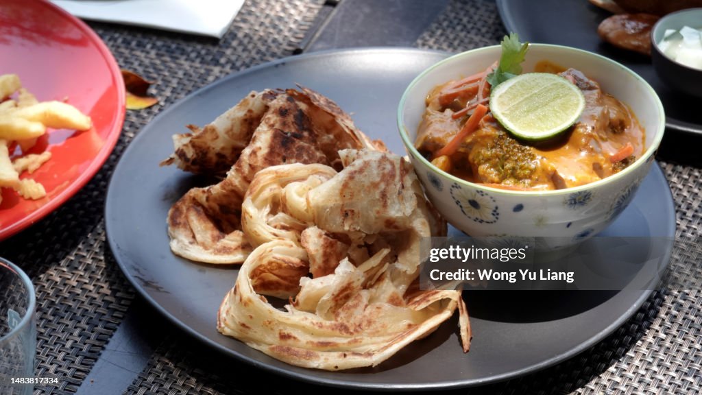 Roti Canai Prata with Chicken Curry