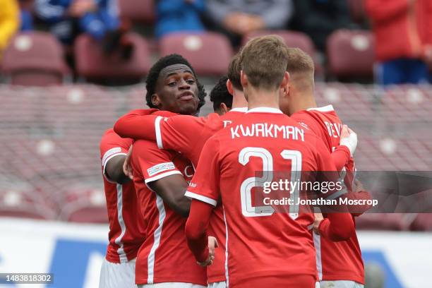 Ernest Poku of AZ Alkmaar celebrates with team mates after scoring to level the game at 1-1 during the UEFA Youth League 2022/23 Semi-Final match...