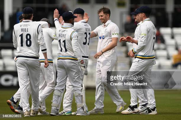 Ben Coad of Yorkshire celebrates with team mates after dismissing Fynn Hudson-Prentice of Sussex during the LV= Insurance County Championship...