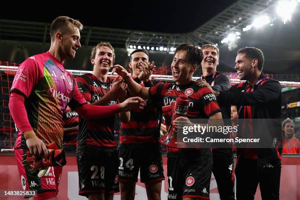 Aidan Simmons of the Wanderers celebrates with team mates after winning the round 25 A-League Men's match between Western Sydney Wanderers and...