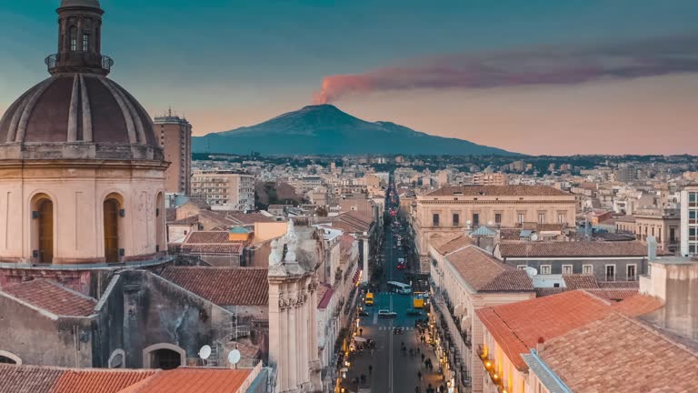 https://media.gettyimages.com/id/1483832308/video/aerial-view-drone-view-of-catania-cityscape-and-mount-etna.jpg?b=1&s=640x640&k=20&c=8Vjw5ywW_PDsjYfIY3nWWkEYJOoy1lzR71ZLEw5MVjI=
