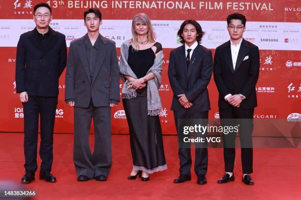 Director Lu Chuan , short track speed skater Wu Dajing , Chinese snowboarder Su Yiming and short track speed-skater Ren Ziwei arrive at opening...