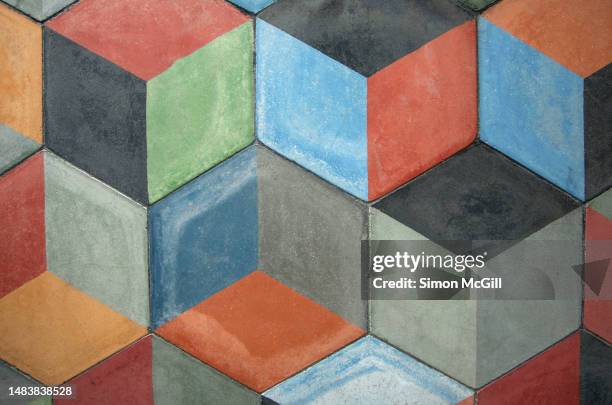 multi-colored cement floor tiles in a cube pattern - mexico wall stock pictures, royalty-free photos & images