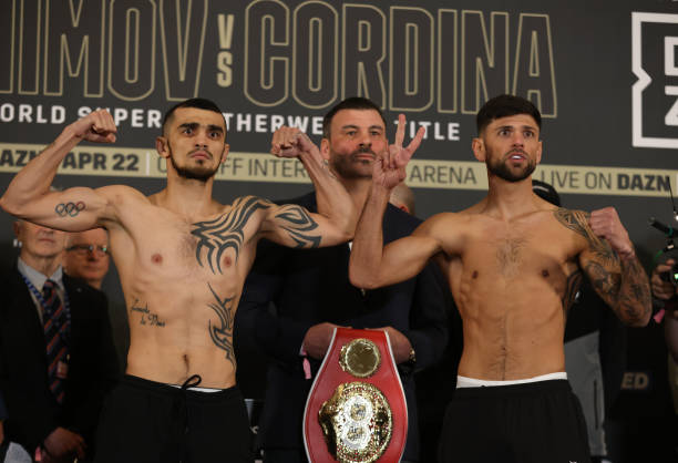 Boxers Shavkatdzhon Rakhimov and Joe Cordina face off during their weigh in ahead of their IBF World Super Feather weight title on April 21, 2023 in...