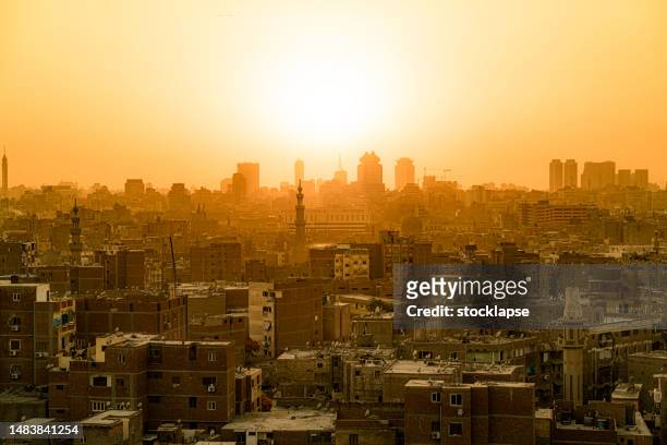 cityscape of cairo at sunset - egypt city stock pictures, royalty-free photos & images