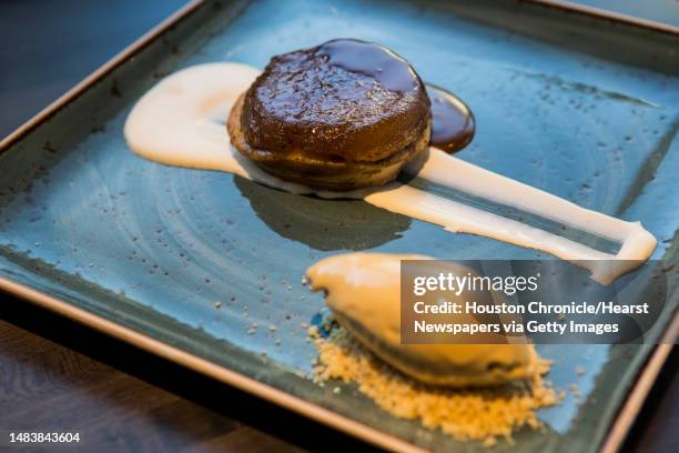 An upside down apple tart, with crème fraîche and caramel sea salt gelato is shown at Fielding's Local Kitchen + Bar on Tuesday, Feb. 2 in The...