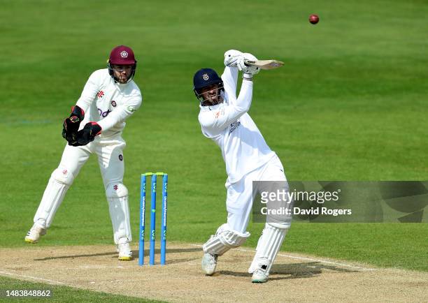 James Vince of Hampshire skies the ball and is caught by Chris Tremain for 186 during the LV= Insurance County Championship Division 1 match between...