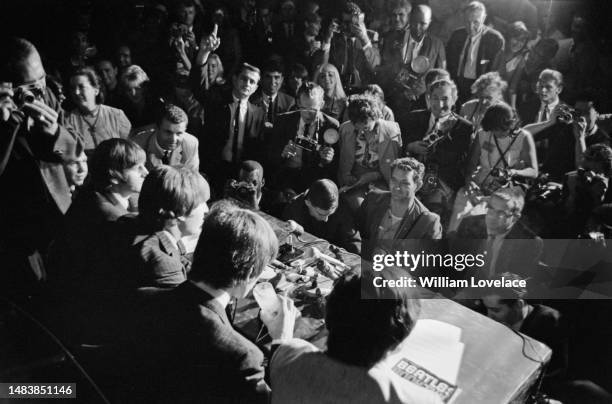 The Beatles hold a press conference at Cinnamon Cinder in Los Angeles, California, before their performance at the Hollywood Bowl, 23rd August 1964....