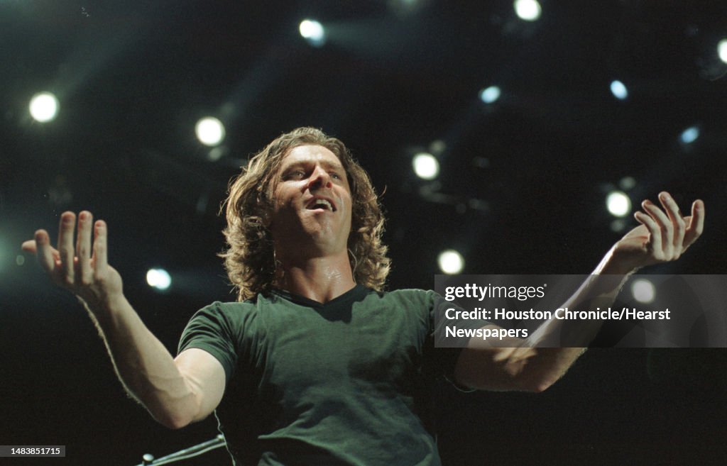 Singer Ed Roland Collective Soul lead singer Ed Roland plays to the crowd during... News ...