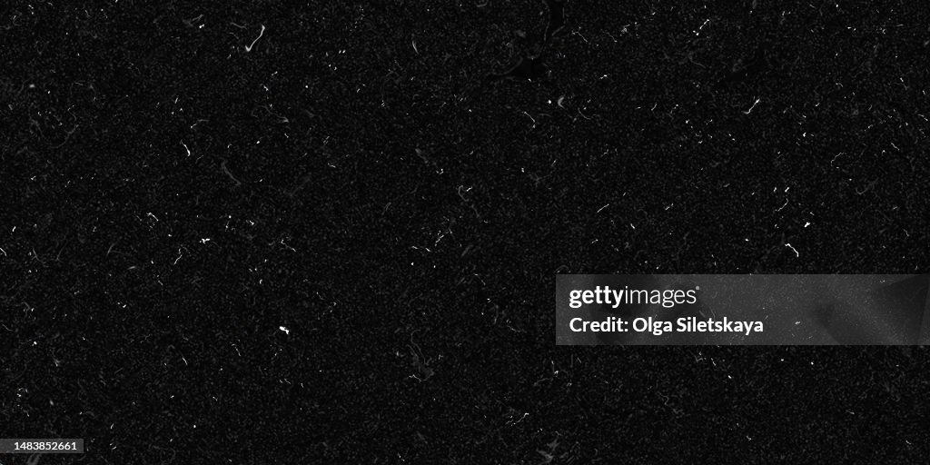 Noise and scratches on a black background