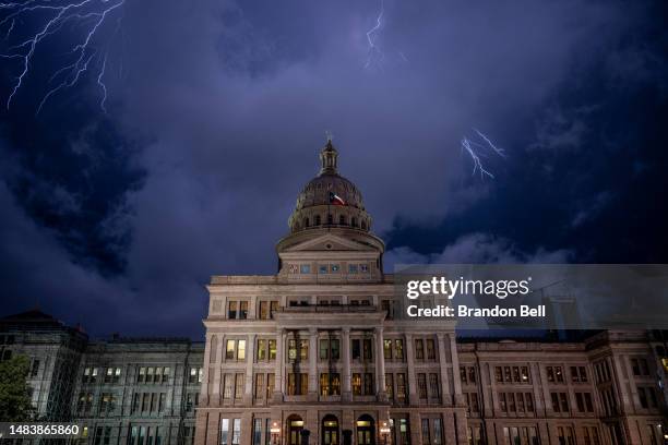 The Texas State Capitol is seen in a thunderstorm on April 21, 2023 in Austin, Texas. Community members and activists rallied together yesterday in...