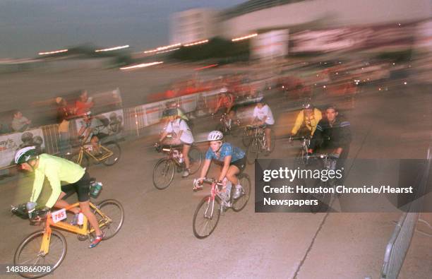 Riders participating in Tanqueray's Texas AIDS Ride 3 take off from the Astrodome complex, starting their 325-mile trek to Dallas, Thursday, Oct. 12...