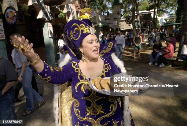 The Empanada Lady, Ligia Revuelia Giles of Cochabamba, Bolivia, hawks her wares during the Texas Renaissance Festival Sunday, Oct. 7 near...