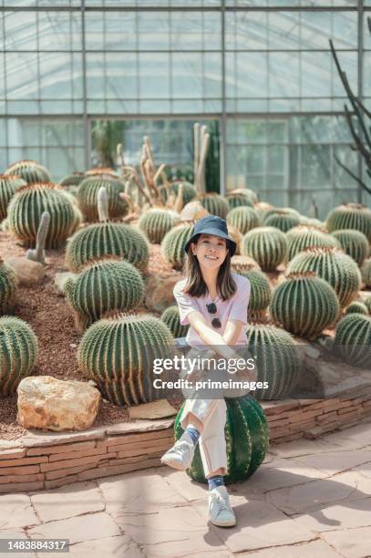 smiling generation z young women enjoying travel chieng mai queen sirikit botanic garden - queen sirikit botanical garden chiang mai stock pictures, royalty-free photos & images