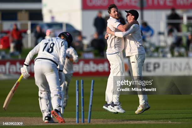 Ollie Robinson of Sussex celebrates with Jack Carson after bowling George Hill of Yorkshire during the LV= Insurance County Championship Division 2...
