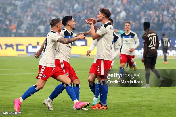 Moritz Heyer of Hamburger SV celebrates with his team mates after scoring their third goal during the Second Bundesliga match between Hamburger SV...