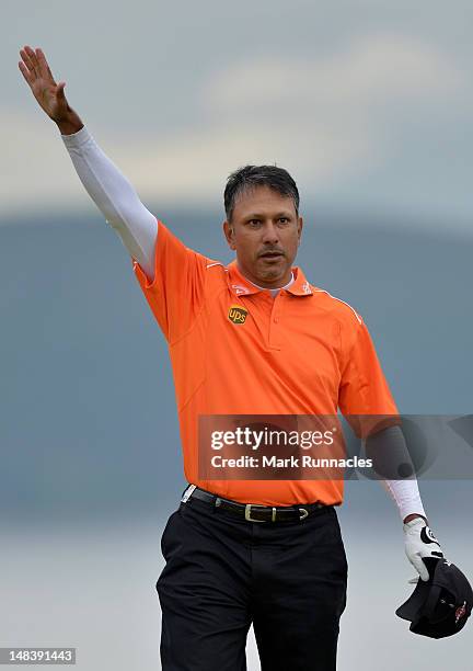 Jeev Milkha Singh of India celebrates holing a putt for victory during a playoff against Francesco Molinari of Italy on the 18th green during the...