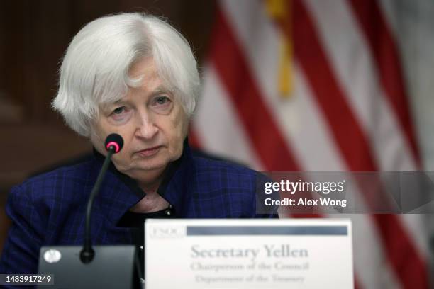 Secretary Janet Yellen listens during an open session of a Financial Stability Oversight Council meeting at the Department of the Treasury on April...