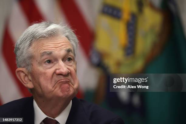 Federal Reserve Board Chairman Jerome Powell listens during an open session of a Financial Stability Oversight Council meeting at the Department of...